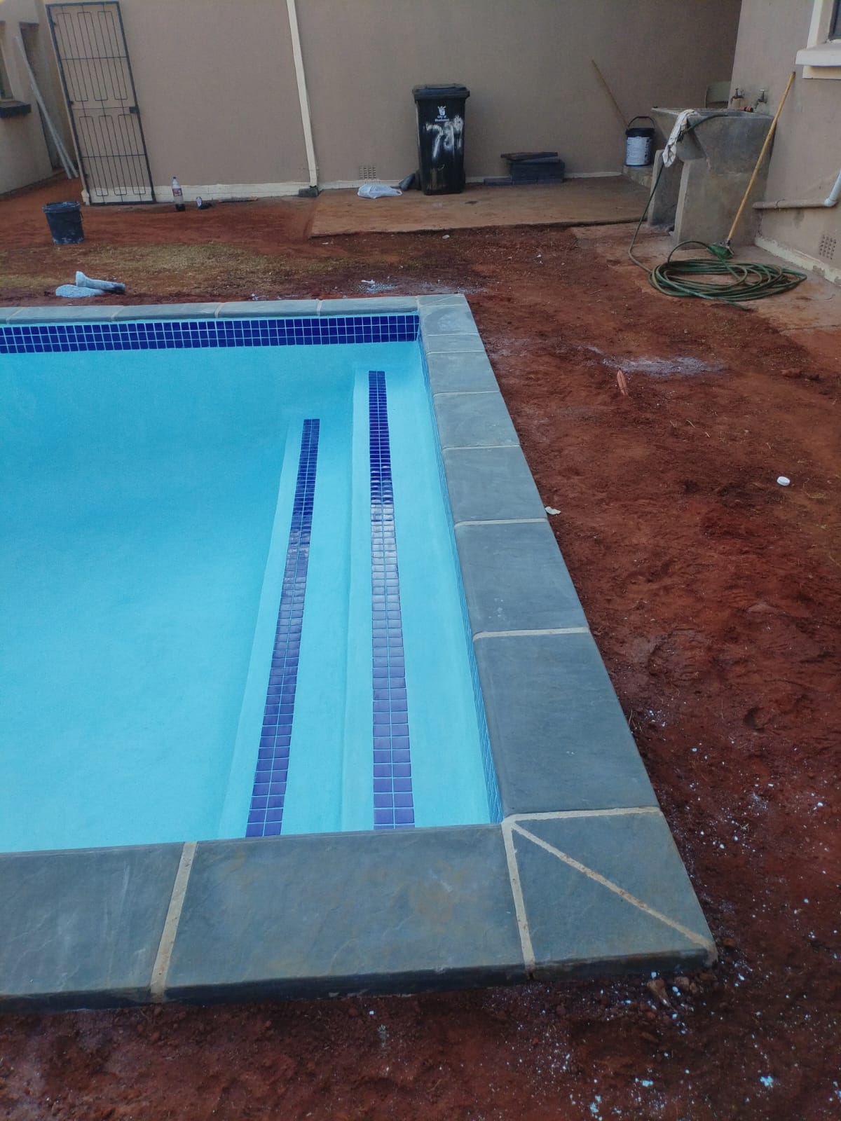 Pool corner with tile lane markers